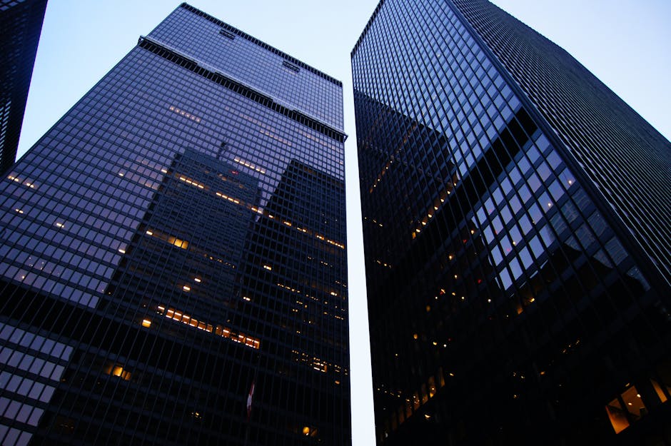 Dramatic low angle view of Toronto's skyscrapers reflecting the evening sky
